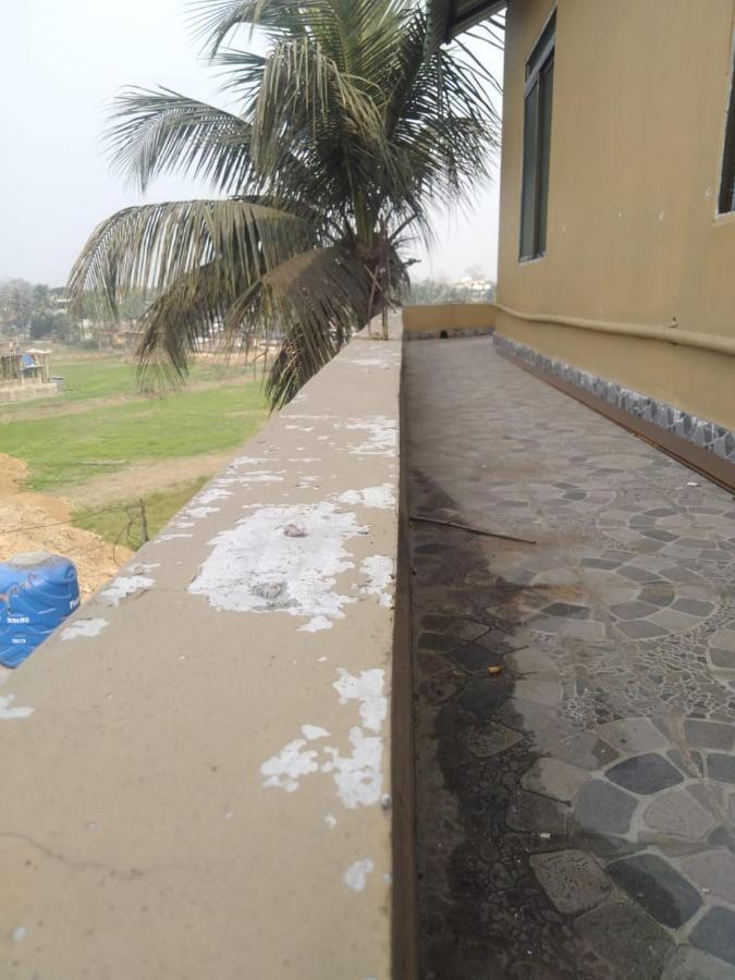 Woodland Lodge And Restaurant Guwahati Buitenkant foto