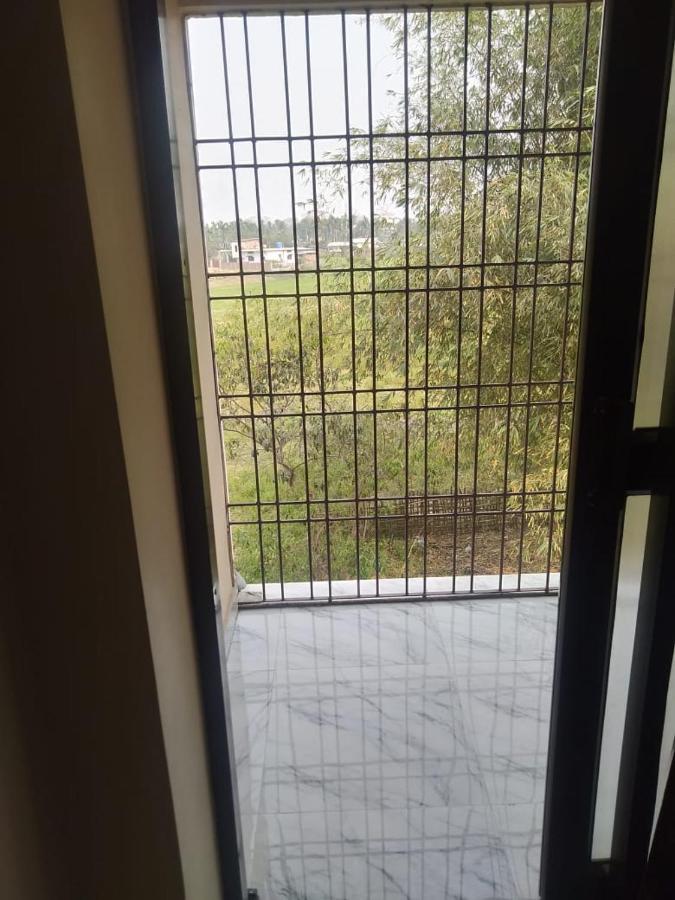 Woodland Lodge And Restaurant Guwahati Buitenkant foto