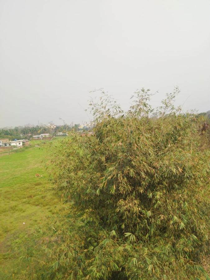 Woodland Lodge And Restaurant Guwahati Buitenkant foto