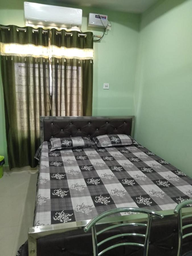 Woodland Lodge And Restaurant Guwahati Buitenkant foto